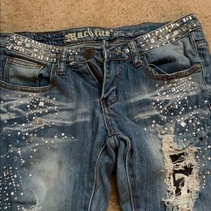 Ripped bejeweled skinny jeans